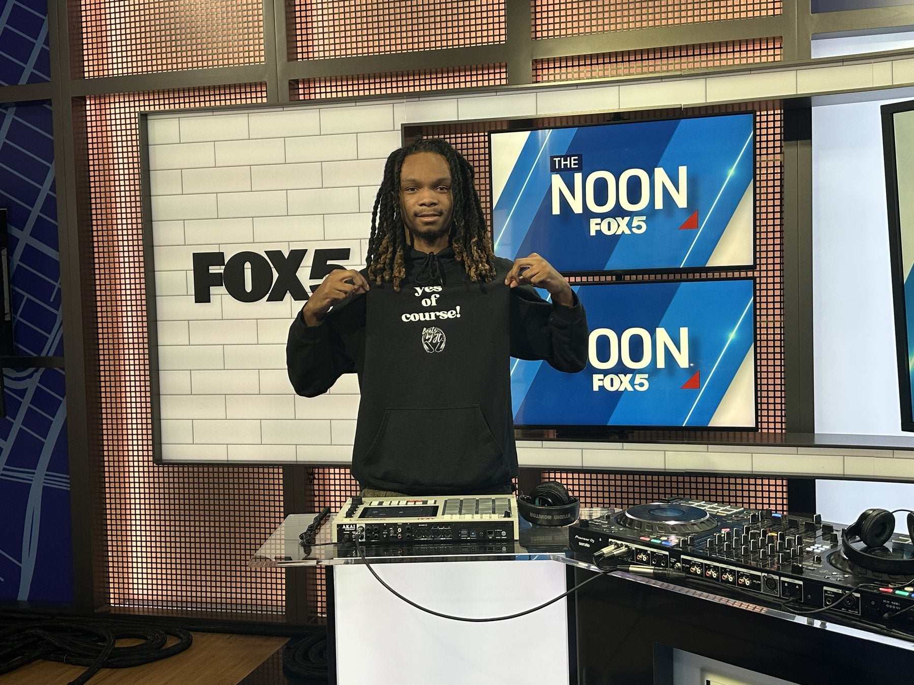 JT at a Fox 5 New York television set with his MPC and headphones.